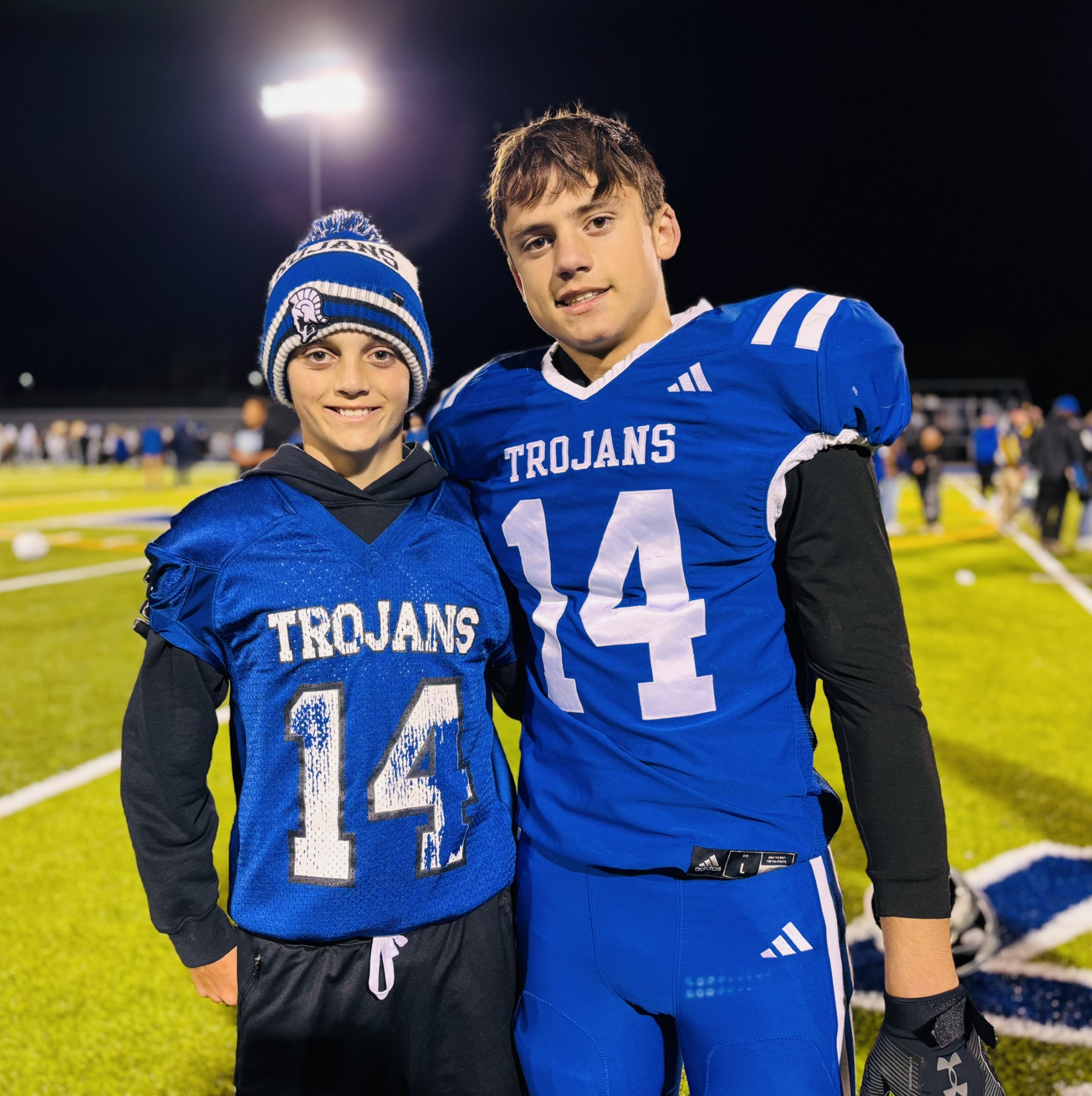 Two boys in football gear