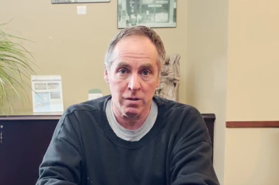 Chris sitting at desk