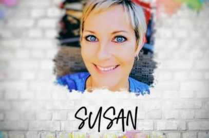 cutout of a smiling woman against a white brick background 