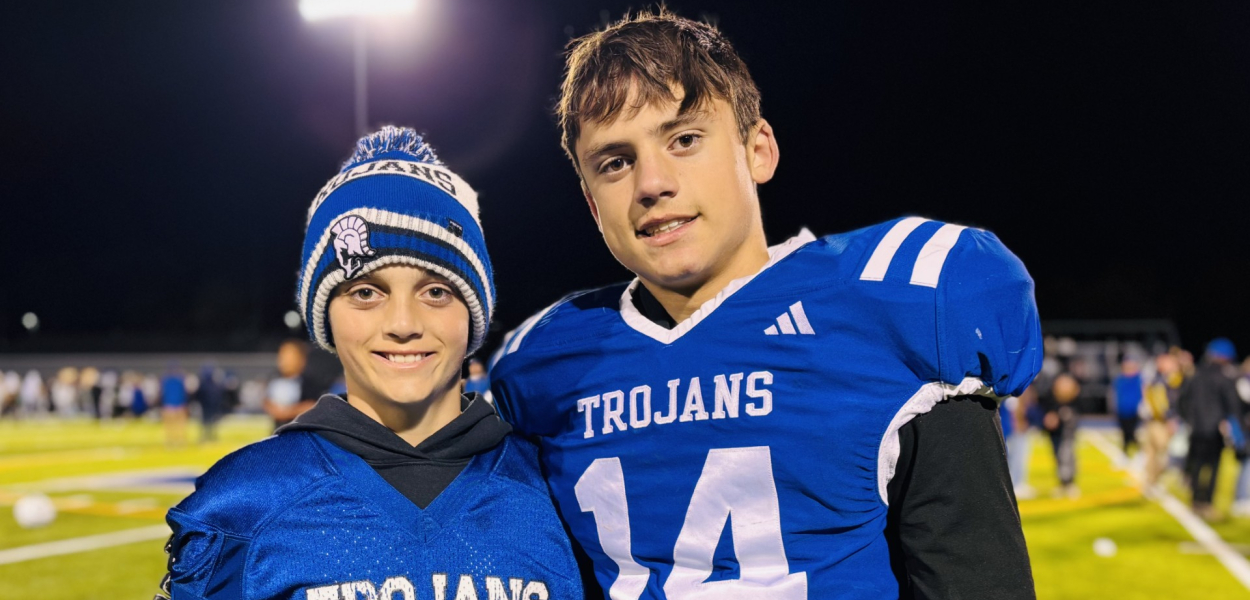 Two boys in football gear