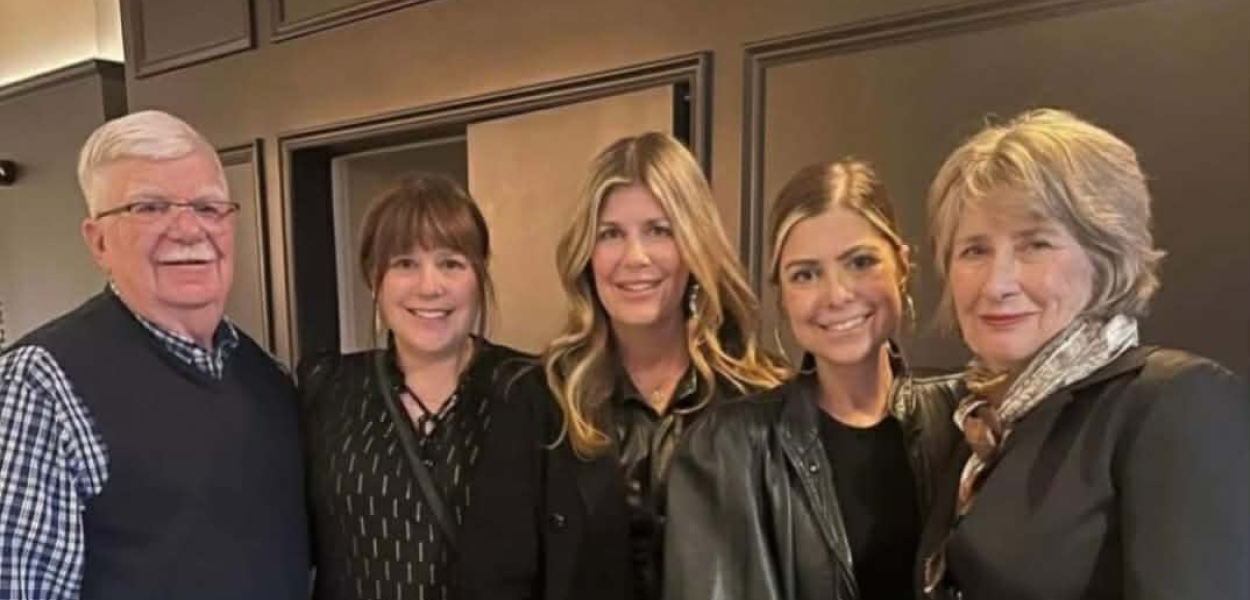 Mary Zack standing with her whole family 