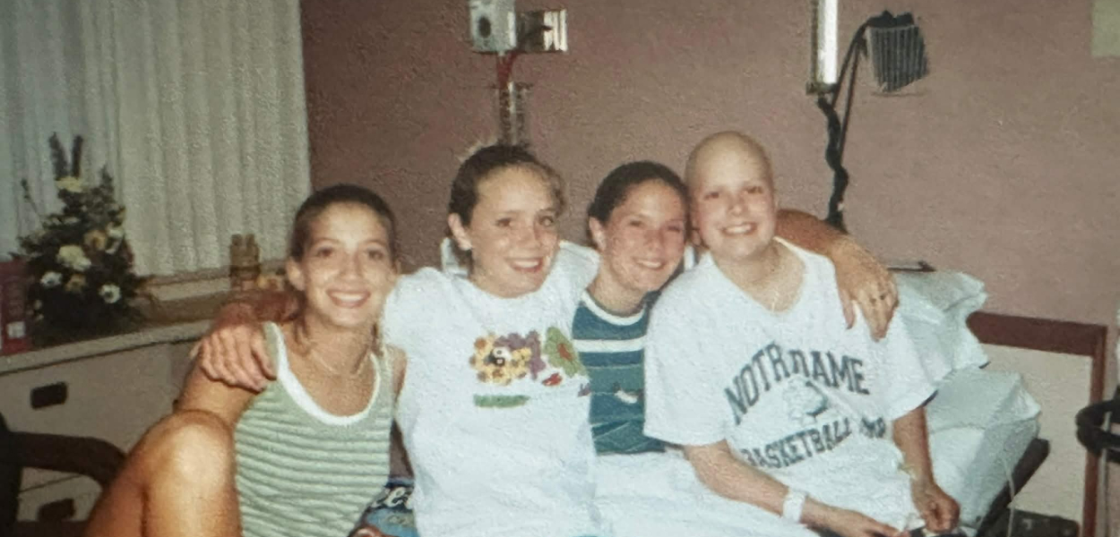 Mary Zack as a teenager on a hospital bed with three other young women