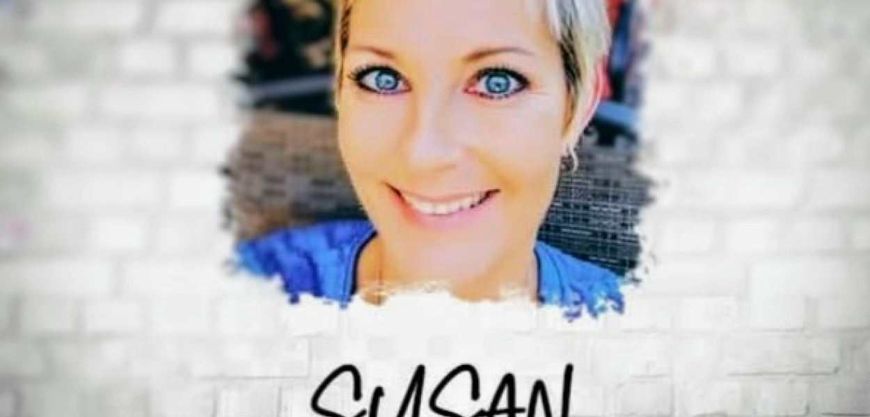 cutout of a smiling woman against a white brick background 